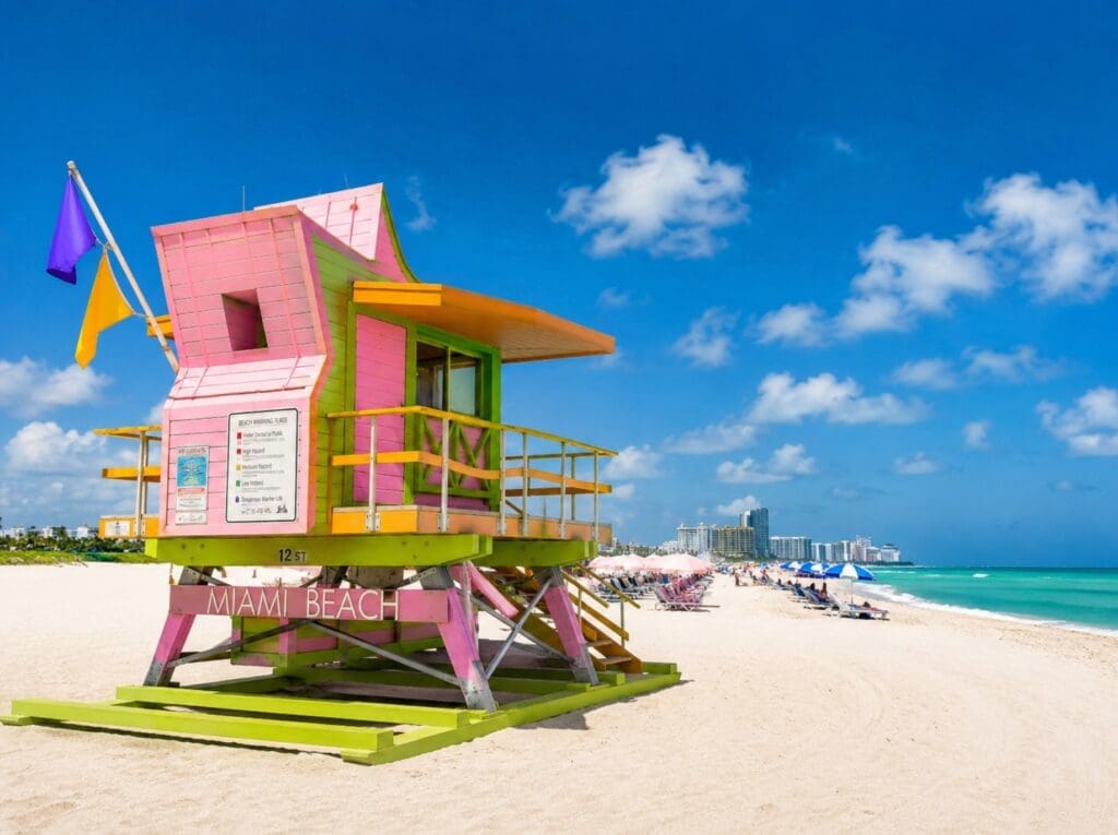 a vibrant photograph of the lifeguard stands at 12th Street Beach